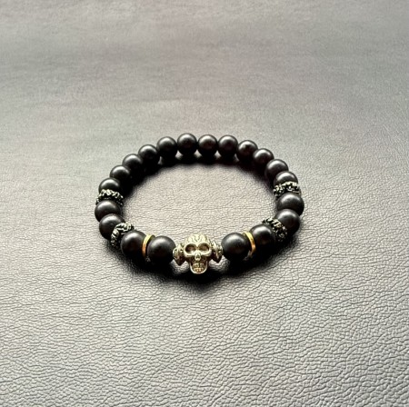 Black obsedian with bras and dustysilver.